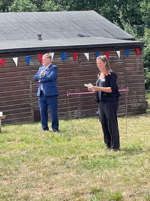 Photo (ii) - Charity Garnett welcomes everyone